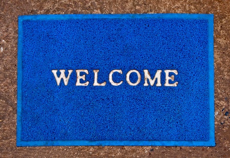 The Doormat of welcome text on floor backgroundの写真素材