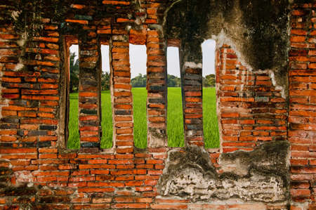 The Ruin of Buddha status and temple of wat mahathat  in ayutthaya historical park, Thailandのeditorial素材