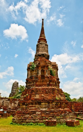 The Ruin of Buddha status and temple of wat mahathat  in ayutthaya historical park, Thailandの写真素材