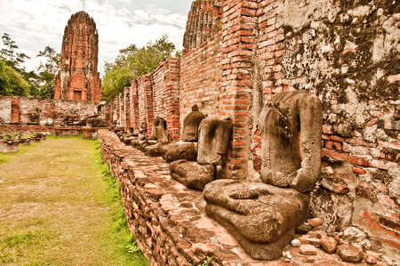 The Ruin of Buddha status and temple of wat mahathat  in ayutthaya historical park, Thailandのeditorial素材