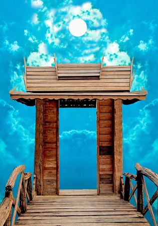 The Old Wooden door with blue sky backgroundの写真素材