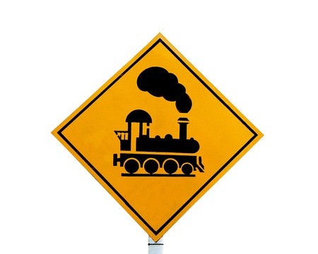 The Railway crossing sign isolated on white backgroundの写真素材