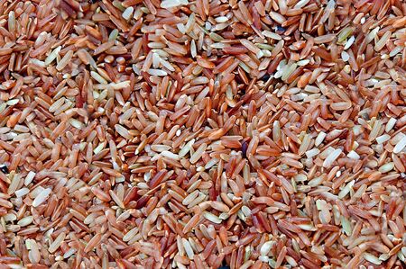 The Closeup brown rice unpolished background textureの写真素材