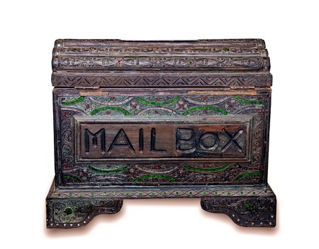 The Old wooden mail box isolated on white backgroundの写真素材