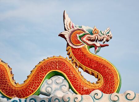 The Red dragon status on sky backgroundの写真素材