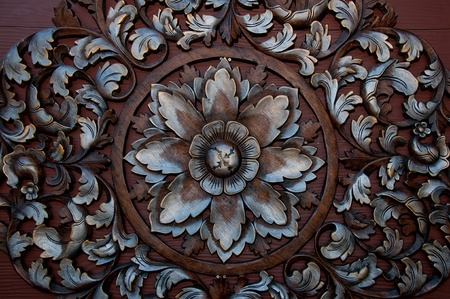 The Old carving wood ornament of flower pattern thai styleの写真素材