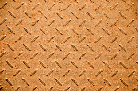 The Grunge steel floor plate background textureの写真素材