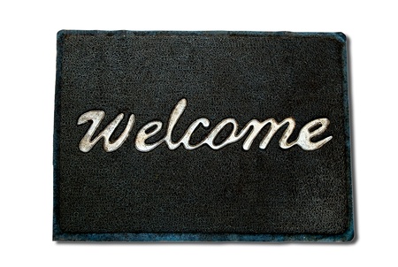 The Doormat of welcome text isolated on white backgroundの写真素材