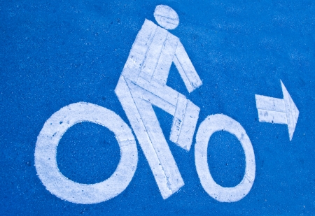 The Bicycle road sign painted on the pavementの写真素材