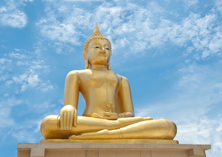 The Buddha status on blue sky backgroundの写真素材