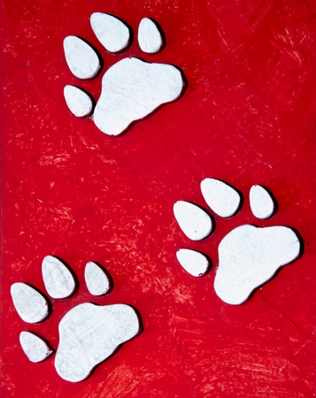 Paw prints on grunge backgroundの写真素材