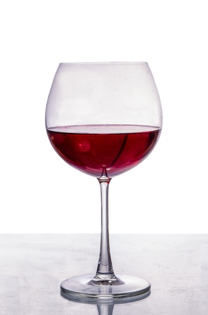 A glass of red wine isolated on white backgroundの写真素材