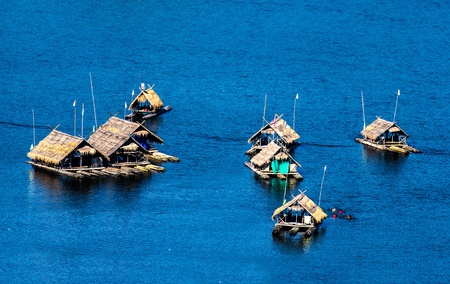 Floating house on riverの写真素材