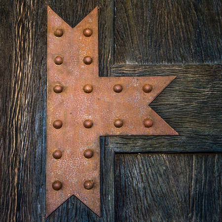 Shape steel on old wood door