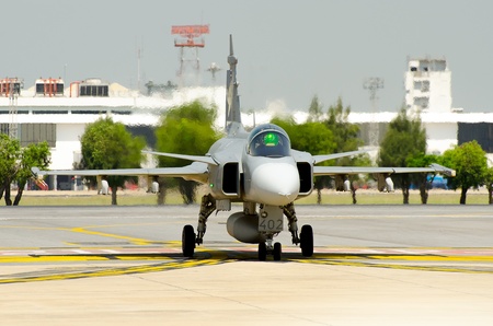 BANGKOK THAILAND - MARCH 23 : The Acrobatic Britling Jet Team performed at event of Breitling Jet Team Under The Royal Sky at Royal Thai Airforce Base Donmuang on March 23, 2013, in Bangkok Thailand.のeditorial素材