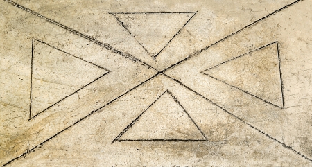 Scratched triangle on cement floor backgroundの写真素材