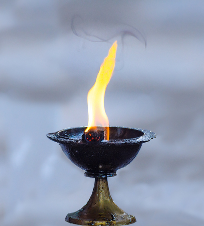 Candle in candlestick for worship geneshaの写真素材