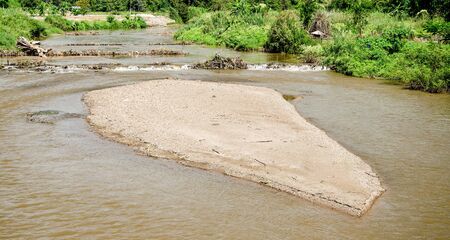 Small island on the riverの写真素材