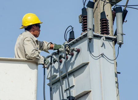 Minburi, Thailand- Nov 9:Electrician are installing high powered electric cables to cope with the...