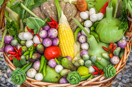Coolorful of vegetables in bamboo basketの写真素材