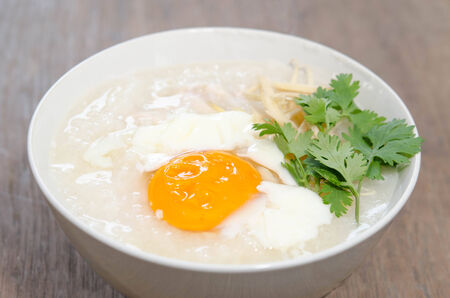 Congee of traditional food Chinese style with soft-boiled eggの写真素材