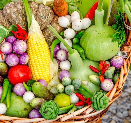 Colorful of vegetables in bamboo basketの写真素材