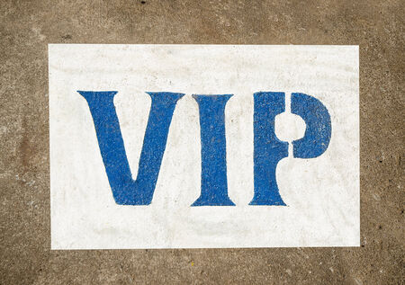 Imprint color of vip text on cement floor backgroundの写真素材