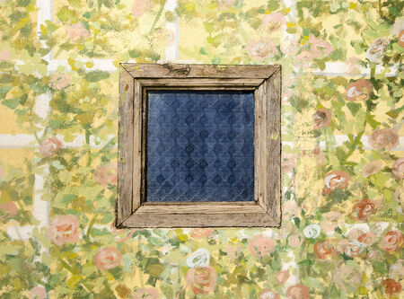 Old wood window on painting cement wall backgroundの写真素材