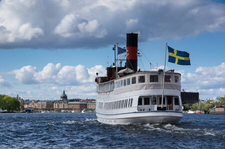 Ship heading to Stockholm city centerの写真素材