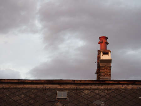 Chimney against a dark skyの写真素材