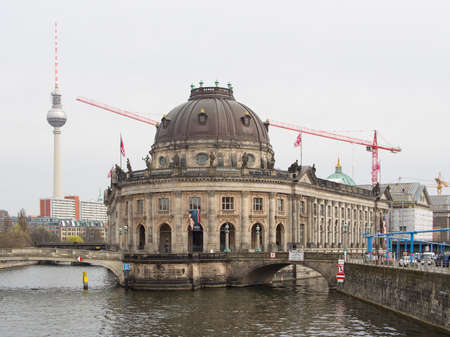 BERLIN, GERMANY - JUNE 29, 2016: famous Bode Museum with Berlin TV Tower in background, Berlin, Germanyのeditorial素材