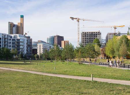 BERLIN, GERMANY - JULY 22, 2016: Gleisdreieck Park with Potsdamer Platz in the background, Berlin, Germanyのeditorial素材