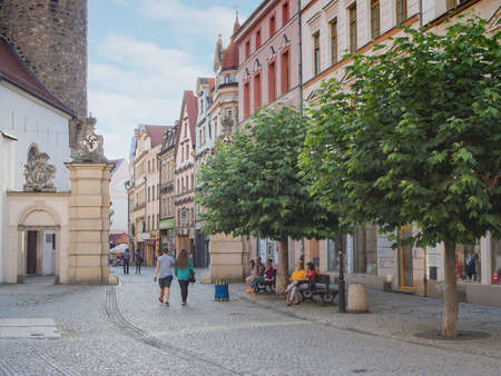JELENIA GORA, POLAND - AUGUST 19, 2016: Tourists At The Historic City Gate in Downtown in Jelenia...
