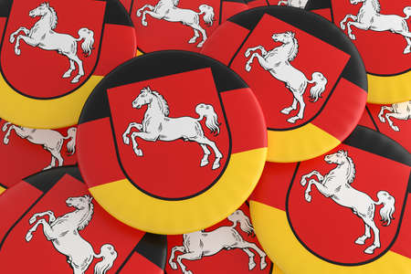 German States Badges: Pile of Lower Saxony Flag Buttons, 3d illustrationの写真素材