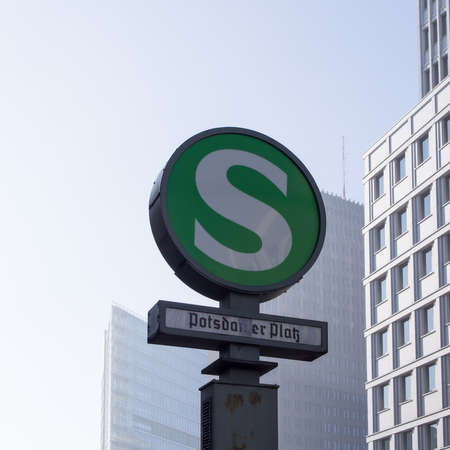 BERLIN, GERMANY - February 14, 2016: S-Bahn Urban Railway Station Sign Potsdamer Platz With Skyscrapers In The Backgroundのeditorial素材