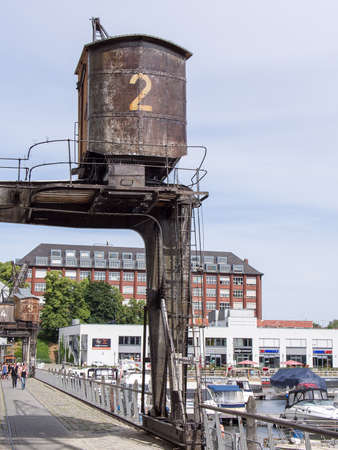 BERLIN, GERMANY - JUNE 21, 2017: Old Wooden Crane In Tempelhofer Hafen, Meaning Harbor of Tempelhof In German Language, In Berlinのeditorial素材