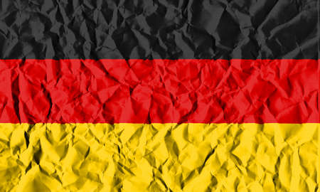 Germany Crisis Concept: Crumpled Paper German Flagの写真素材