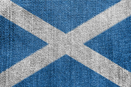 Scotland Textile Industry Or Politics Concept: Scottish Flag Denim Jeans Background Textureの写真素材