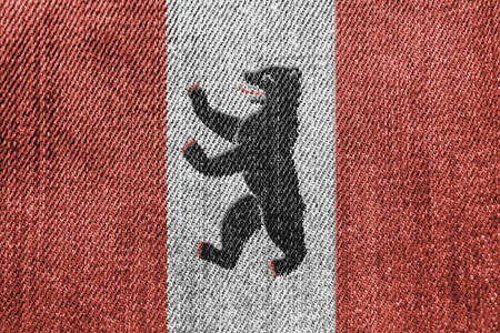 Textile Industry Or Politics Concept: Berlin Flag Denim Jeans Background Textureの写真素材