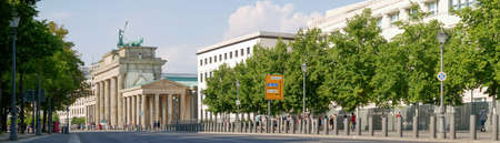 BERLIN, GERMANY - AUGUST 4, 2018: Panorama of Brandenburger Tor With Avenue And Trees In Berlin,...