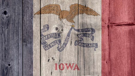 USA Politics News Concept: US State Iowa Flag Wooden Fenceの写真素材