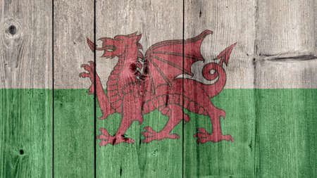 Wales Politics News Concept: Welsh Flag Wooden Fenceの写真素材