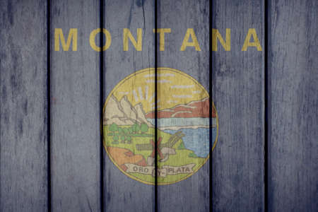USA Politics News Concept: US State Montana Flag Wooden Fenceの写真素材