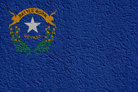 US State Politics Or Business Concept: Nevada Flag Wall With Plaster, Background Textureの写真素材