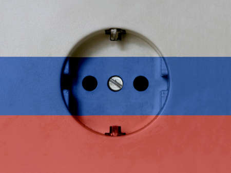 Electricity Concept: Dirty Type F Power Socket With Russia Flag