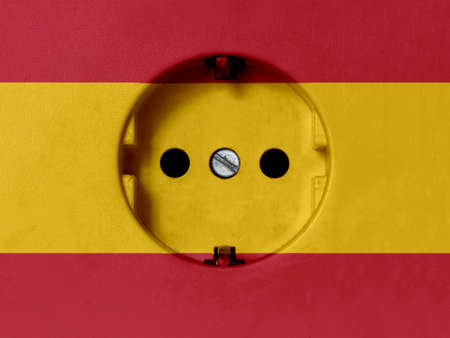 Electricity Concept: Dirty Type F Power Socket With Spain Flagの写真素材