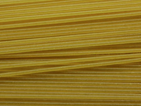 Close-up of Uncooked Spaghetti, Top View Background Textureの写真素材