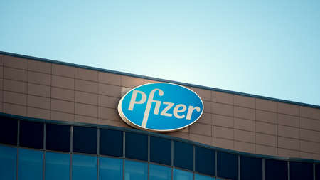 BERLIN, GERMANY - FEBRUARY 8, 2020: Logo of Pharmaceutical Corporation Pfizer At The German Headquarters In Berlin, Germanyのeditorial素材