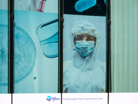 Advertisement of Pharmaceutical Corporation Pfizer At The German Headquarters In Berlinのeditorial素材