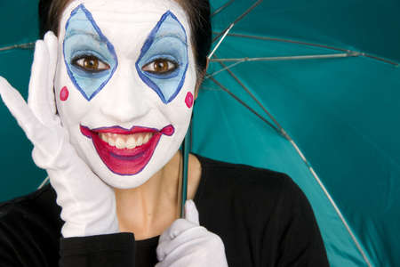 Really Excited Clown with Teal Umbrellaの写真素材
